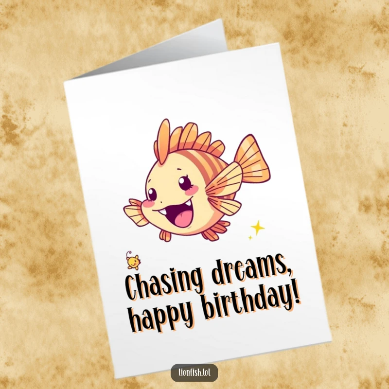 Funny free printable birthday card: a cheerful lionfish excitedly chasing a tiny twinkling speck, celebrating with playful enthusiasm.