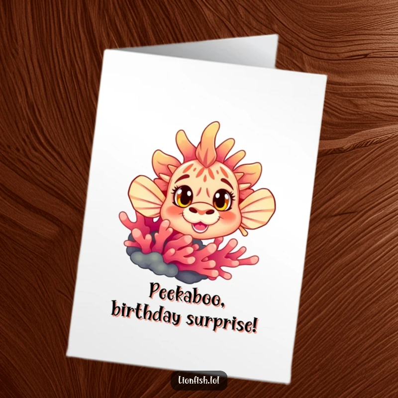 Funny Free Printable Birthday Card: A cute lionfish with wide, curious eyes peeking from behind colorful coral.
