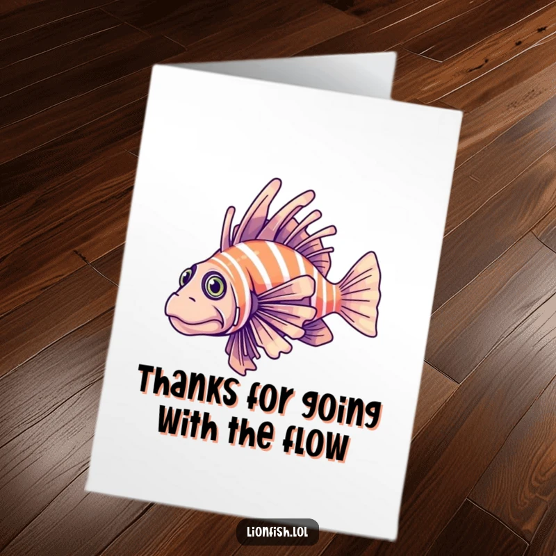 Funny free printable thank you card: a determined lionfish elegantly gliding through clear blue water, offering thanks with grace.